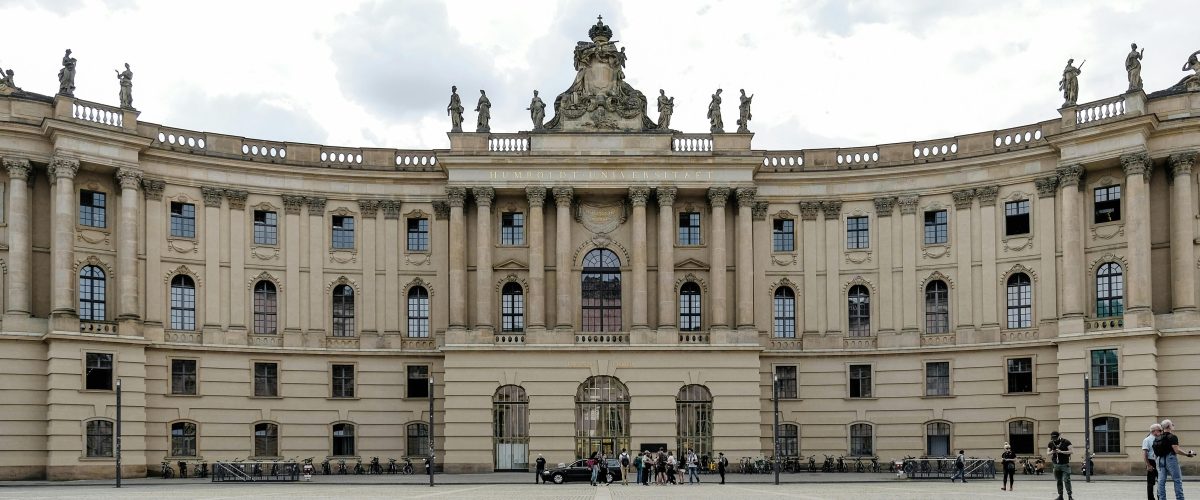 Elegant facade of Humboldt University's library in Berlin, showcasing neoclassical architecture.